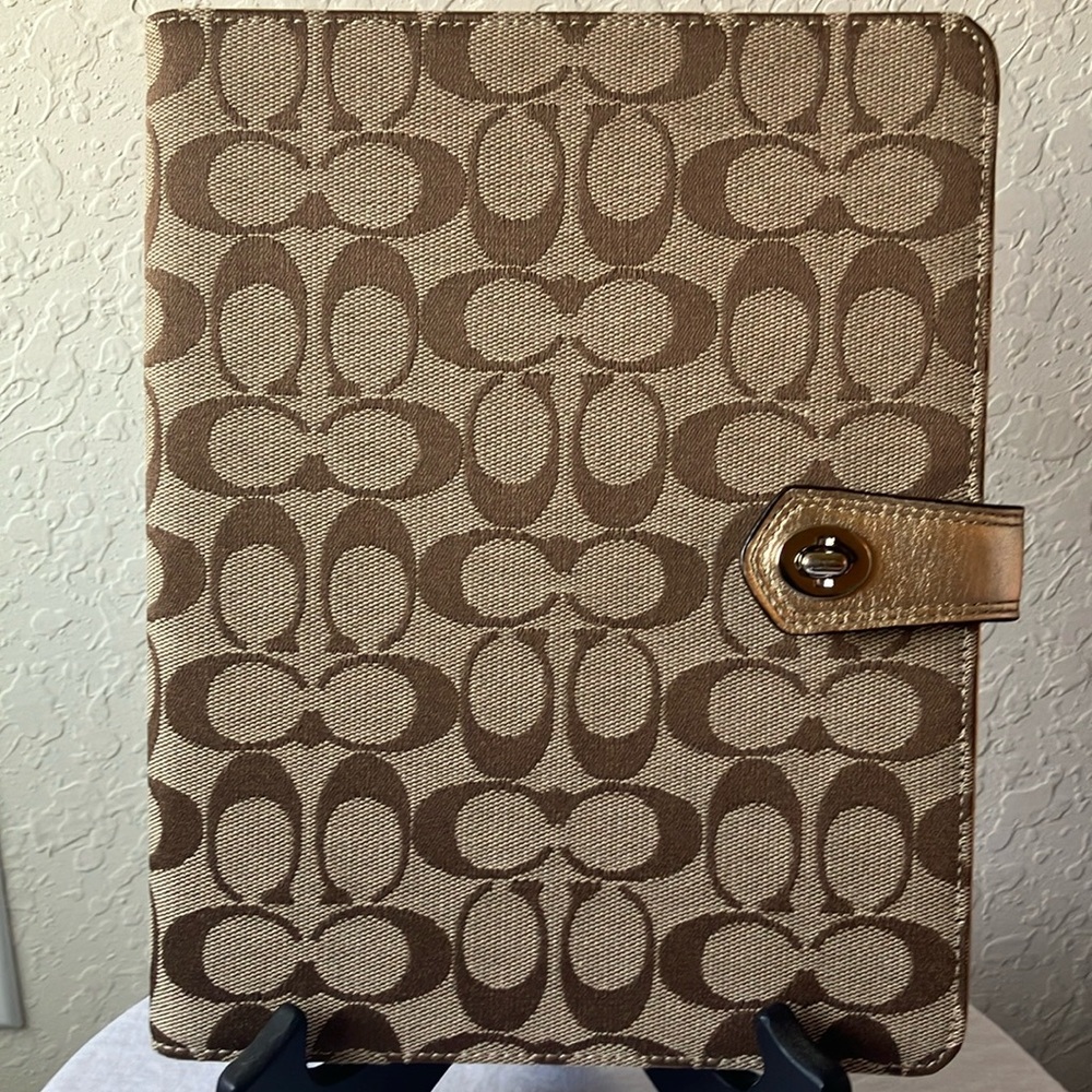 Coach: Brown Signature iPad case/holder with pink inside